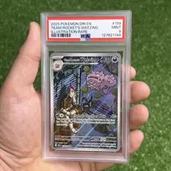 PSA Mint 9 2025 POKEMON DRI EN-ILLUSTRATION RARE #199 TEAM ROCKET'S WEEZING - Image 1