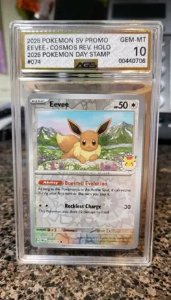 2025 SV Promo 074 Eevee Cosmos Reverse Holo Pokemon Day Stamp AGS 10 WITH SWIRL! - Image 1