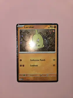 Pokemon TCG Obsidian Flames 105/197 Larvitar Cosmos Holo NM - Image 1