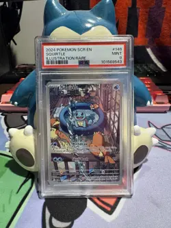 2024 POKEMON SCR EN SQUIRTLE IR PSA 9 - Image 1