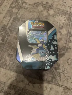 POKEMON TCG Collector TIN [For the EONS] Set VAPOREON V w/4 PKs NEW! - Image 1