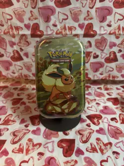 POKEMON PRISMATIC EVOLUTIONS MINI TIN NEW/SEALED MINT - ASSORTED TINS - Image 1