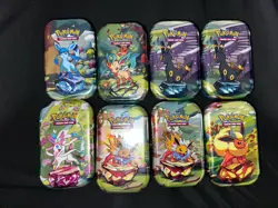 New Sealed Pokemon TCG Prismatic Evolutions Set of 8 Pack Tin Collection - Image 1