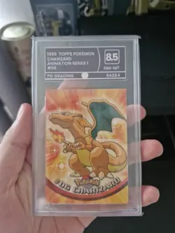Pokemon TCG Charizard 06 1999 Topps Blue Logo Animation Series 1 - Grade 8.5 - Image 1