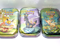Pokemon TCG Prismatic Evolutions Mini Tin Lot of 3-New/Factory Sealed -HIGH DMND - Image 1