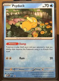 Pokemon TCG Psyduck 007 Me: Mega Evolution Black Star Promo Holo Card SWIRL - Image 1