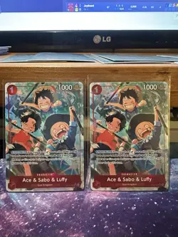 Ace & Sabo & Luffy (Alternate Art) OP13-007 Carrying On His Will Foil 2x - Image 1