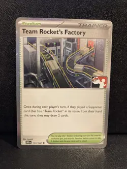Team Rocket's Factory (Cosmos Holo) Pokemon Prize Pack Series 8 DRI 173/182 NM - Image 2