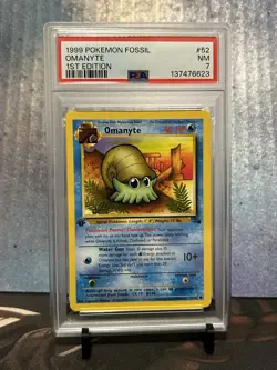 1999 Pokemon Fossil Omanyte 1st Edition #52 PSA 7 - Image 1