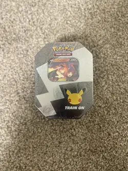 Pokemon TCG Celebrations 25th Anniversary Tin Factory Sealed Lance’s Charizard V - Image 1