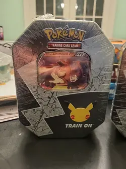 Pokemon TCG Lance’s Charizard V Celebration Tin. 25th Anniversary Factory Sealed - Image 1