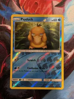 Psyduck 40/236 Cosmic Eclipse Sun & Moon Reverse Holo Pokemon TCG NM - Image 1