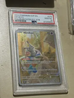 2024 POKEMON PALDEAN FATES POKEMON CENTER ETB PROMO SVP #075 MIMIKYU PSA 10 - Image 1