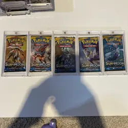 Pokemon Sun & Moon Base Art Set Of 5 Booster Packs Factory Sealed In Acrylic - Image 1