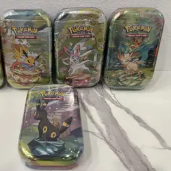Pokemon TCG: Scarlet & Violet - Prismatic Evolutions Mini Tins LOT SET OF 4 - Image 1