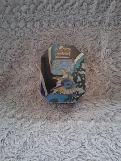 SEALED Pokemon Trading Card Game: Evolutions Tin - Vaporeon - Image 1