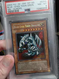 Yu-Gi-Oh! Blue-Eyes Toon Dragon MRL-E000 Triple Error 1st edition PSA 8 - Image 1