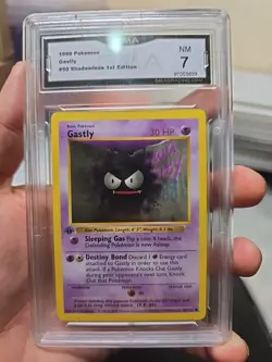 1999 POKEMON GASTLY SHADOWLESS 1ST EDITION 50/102 GMA NM 7 - Image 1