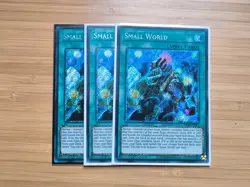 Small World x3 (Platinum Secret) - RA01-EN067 - YuGiOh Card - Image 1