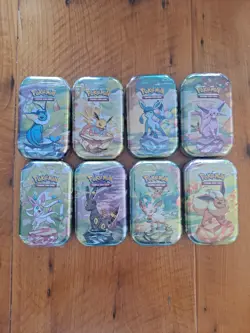Pokemon TCG Prismatic Evolutions Mini Tins Set of 8 Brand New Factory Sealed - Image 1