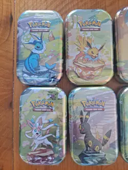 Pokemon TCG Prismatic Evolutions Mini Tins Set of 8 Brand New Factory Sealed - Image 2