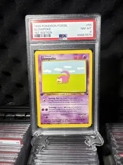 1999 POKEMON FOSSIL #55 SLOWPOKE 1ST EDITION PSA 8 - Image 2