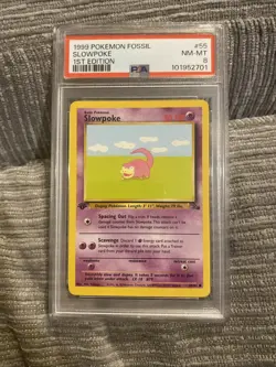 1999 Pokemon Fossil 1st Edition Slowpoke 55/62 PSA 8 NM-MT - Image 1