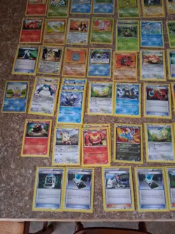 Pokemon Cards Lot Of 103 Mixed Years A Few Duplicates All In Protective Sleeve - Image 2