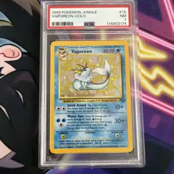 1999 Pokemon Vaporeon Jungle Holo 12/64 PSA 7 - Image 1
