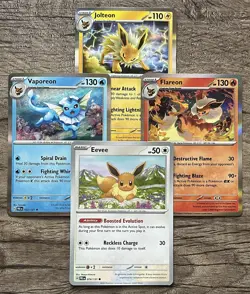 Pokemon PRISMATIC EVOLUTIONS 4 Card Lot Set Eevee Jolteon Vaporeon Flareon - Image 1