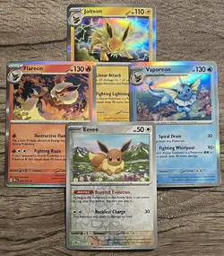 Pokemon PRISMATIC EVOLUTIONS 4 Card Lot HOLO Set Eevee Jolteon Vaporeon Flareon - Image 1