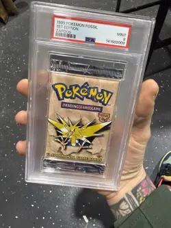 1999 Pokemon 1st Edition Zapdos Art Fossil Pack PSA 9 - Image 1