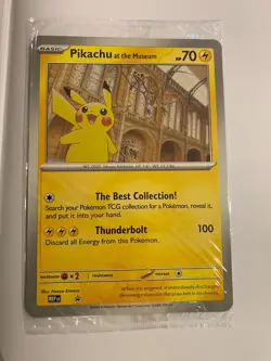 Pokemon Natural History Museum Jumbo Pikachu Promo Card in hand - Image 1