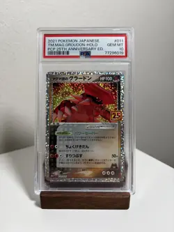 Team Magma's Groudon #11 Pokemon Japanese 25th Anniversary Promo PSA 10 - Image 1