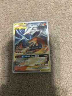 Reshiram & Charizard GX 20/214 Unbroken Bonds 2019 WORLD CHAMPIONSHIP Pokemon - Image 1