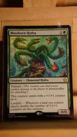 Mossborn Hydra - NM - Foundations - MTG - Image 1