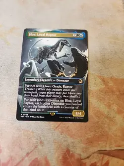 Blue, Loyal Raptor Borderless Universes Beyond Jurassic World MTG NM - Image 1