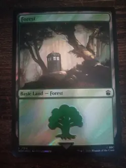FOIL - MTG Forest (1164) (Surge Foil) - Universes Beyond: Doctor Who - Image 1