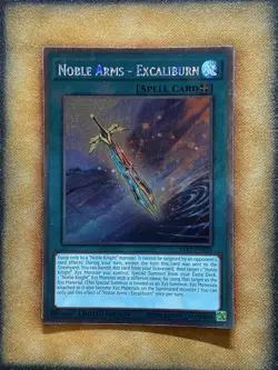 Yugioh Noble Arms - Excaliburn NKRT-EN023 Platinum Rare Limited Edition LP - Image 1