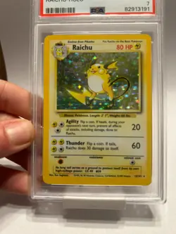 PSA 7 Raichu 14/102 Unlimited Base Set Holo Rare 1999 Pokemon Card NM - Image 3