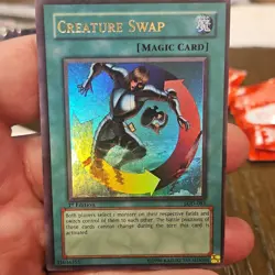 Yu-Gi-Oh! Creature Swap Legacy of Darkness LOD-081 1st Edition Holo Spell - Image 1
