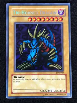 Yugioh Tri-Horned Dragon LOB-000 Secret (MP) - Image 1