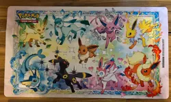 Pokemon Prismatic Evolutions Eeveelutions Playmat – UPC Exclusive - Image 1