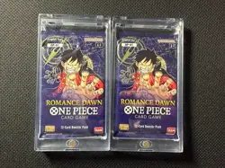 Two Romance Dawn One Piece Packs with Hard Acrylic Cases. Sealed. - Image 1