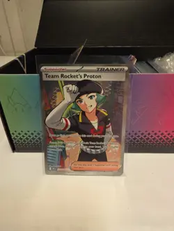 Team Rocket’s Proton 227/182 Trainer Full Art Destined Rivals Pokemon TCG Cards - Image 1