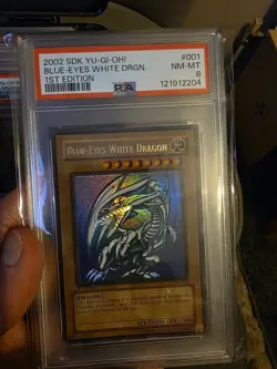 Yu-Gi-Oh Blue-Eyes White Dragon SDK-001 1st Edition PSA 8 Ultra Rare - Image 1
