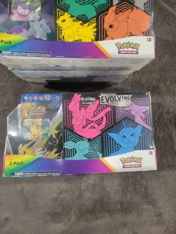 Pokemon TCG Costco Bundle Evolving Skies ETB & Mew V Tin Sealed 2-Pack - Image 1