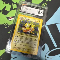 Jolteon Pokemon Card 1999 Jungle 4/64 Holo CGC Graded 8.5 - Image 1