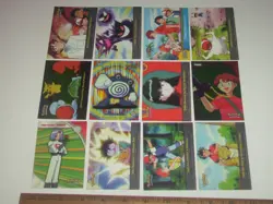 12 Topps 2000 Pokemon series trading cards. 2 chrome, 1 sticker, trainers & more - Image 1