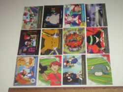 12 Topps 2000 Pokemon series trading cards. 2 chrome, 1 sticker, trainers & more - Image 1